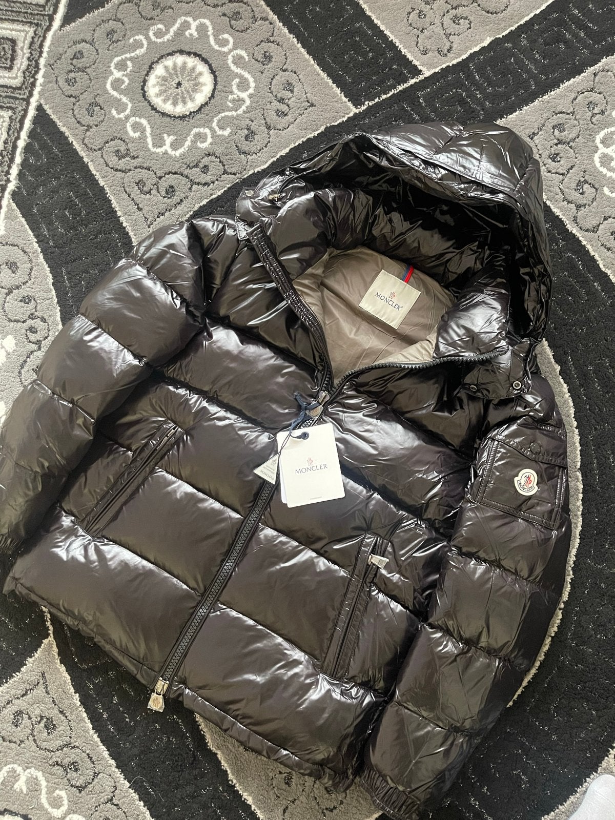Moncler Maya, Ophalen of Verzenden, Zo goed als nieuw, Maat 52/54 (L), Zwart