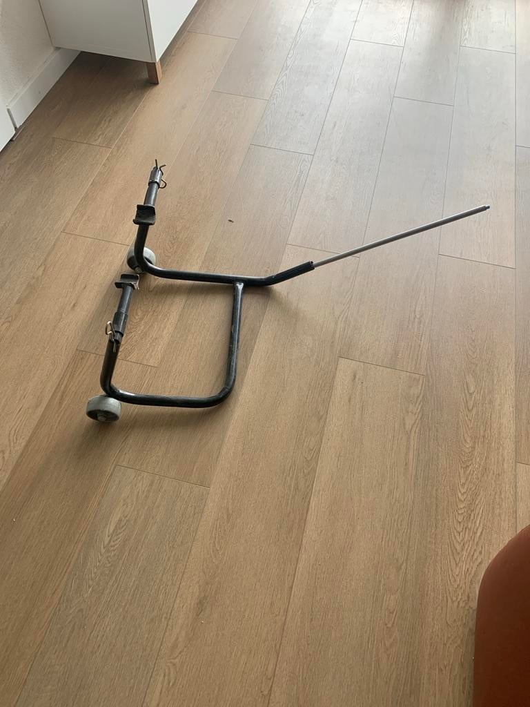 Motorfiets paddockstand, Ophalen