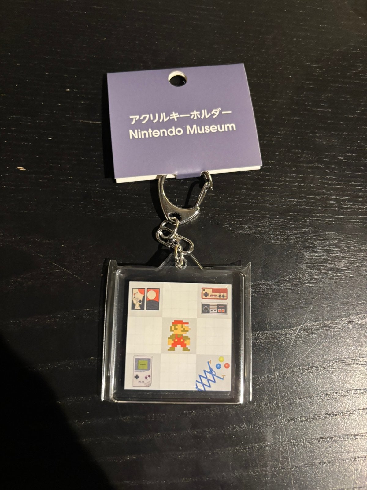 Nintendo Museum - Keychain Limited, Ophalen of Verzenden, Zo goed als nieuw