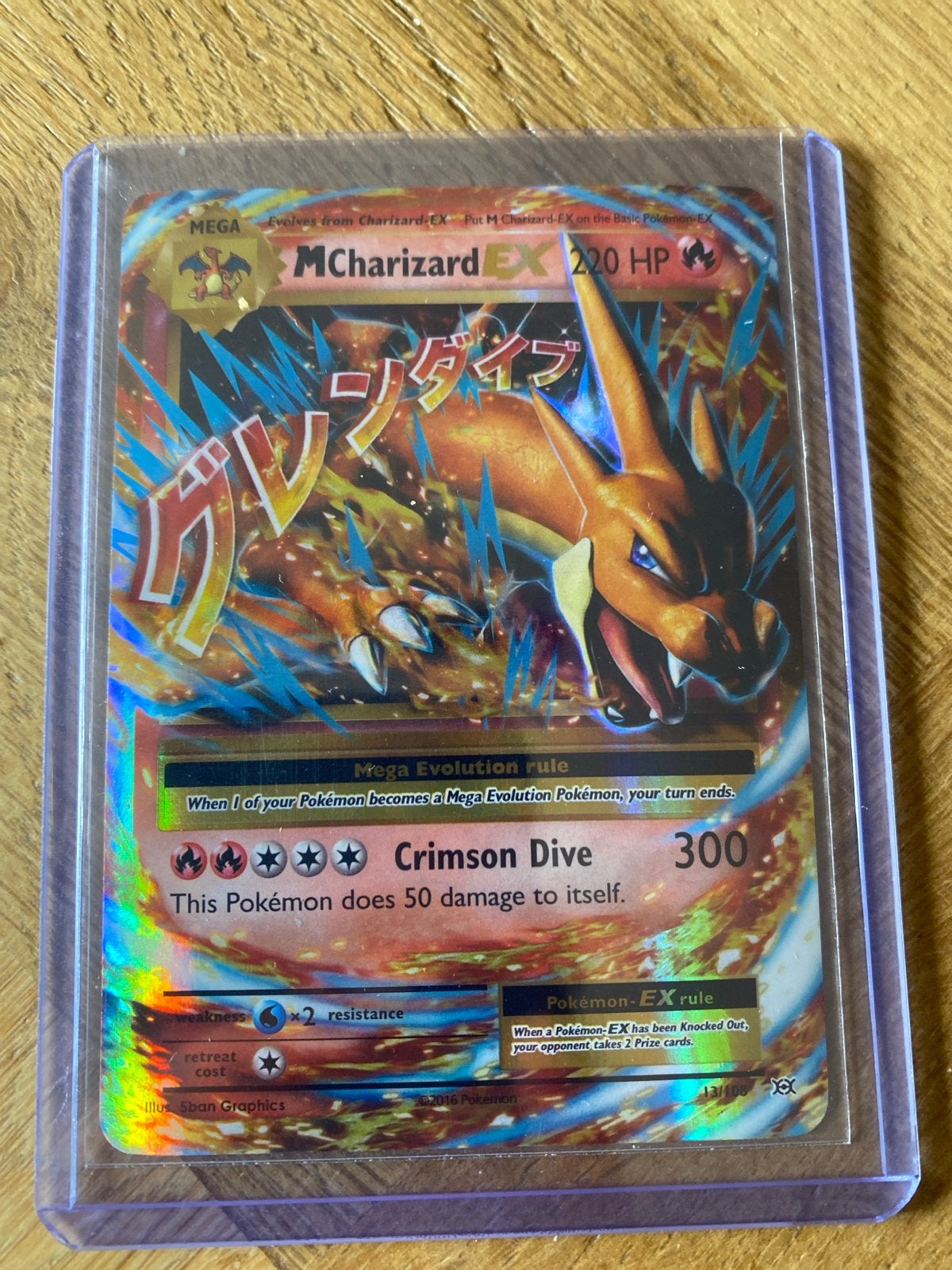 Pokémon M Charizard EX 220 HP (Foil) - Zo goed als nieuw, Ophalen of Verzenden, Zo goed als nieuw, Losse kaart, Foil