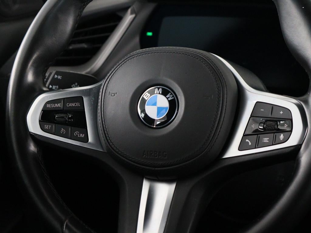 BMW 1 Serie 118i Business Edition (bj 2022, automaat), Auto's, BMW, 136 pk, Gebruikt, Met garantie (alle), Leder en Stof