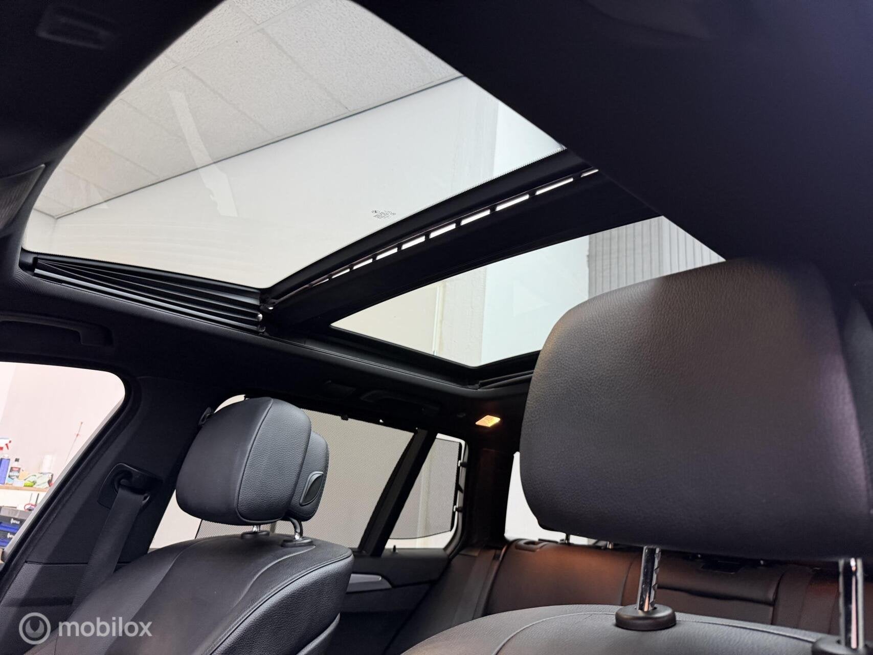 Foto 15 van BMW 5-serie Touring 520i High Executive