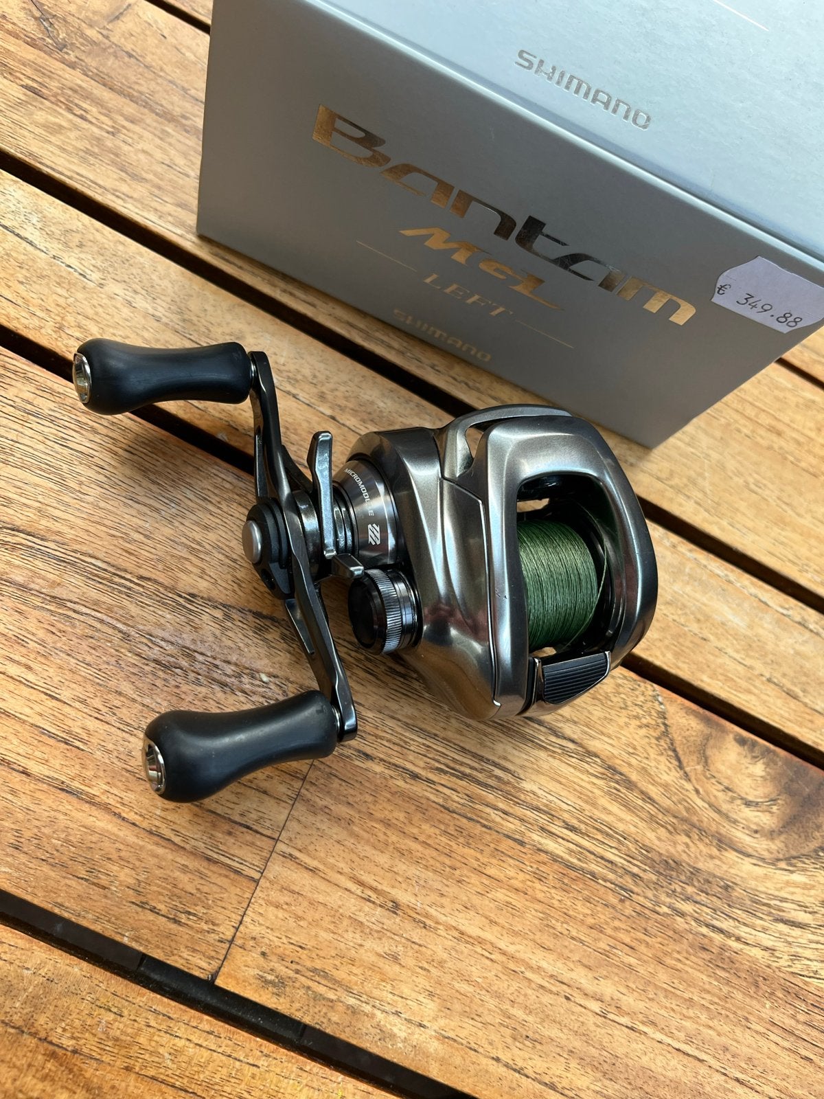 Shimano Bantam 151 MGL baitcaster met nieuwe Daiwa braid, Ophalen of Verzenden, Gebruikt, Molen
