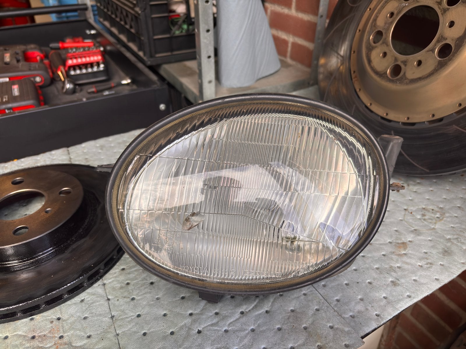 Koplamp Toyota Corolla E11 met hoogte verstelling, Ophalen of Verzenden, Gebruikt, Toyota