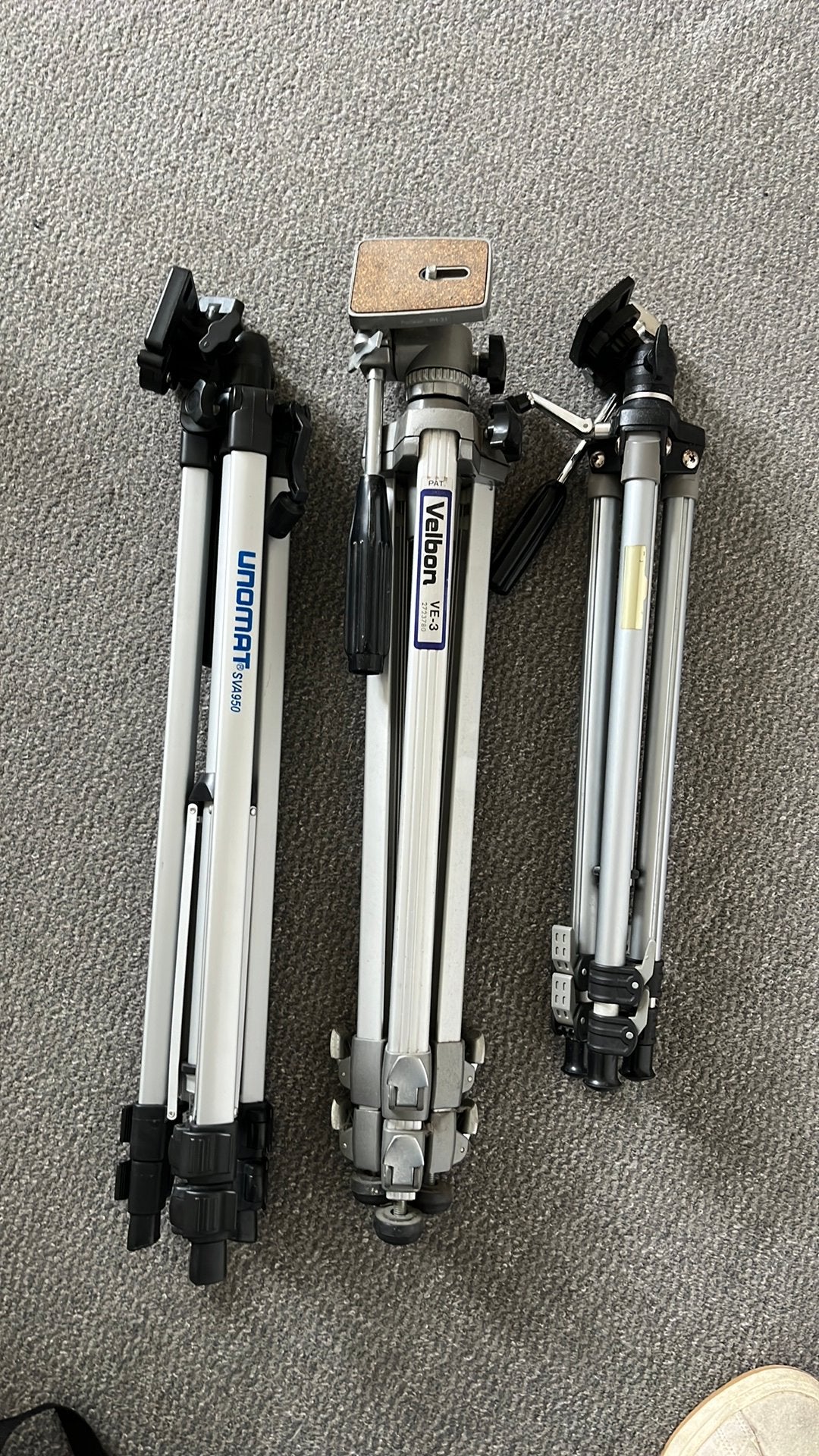 Set van 3 camerastatieven: Velbon, Unomat en onbekend, Ophalen, Gebruikt, Driepoot, 150 tot 175 cm