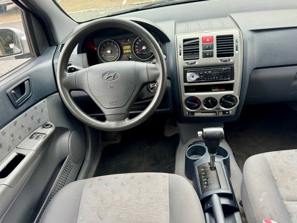 Hyundai GETZ 1.3i GLS 5DRS AUT AIRCO NAP APK 2-2027 NETTE AU, Auto's, Hyundai, 450 kg, 4 cilinders, 82 pk, Bedrijf