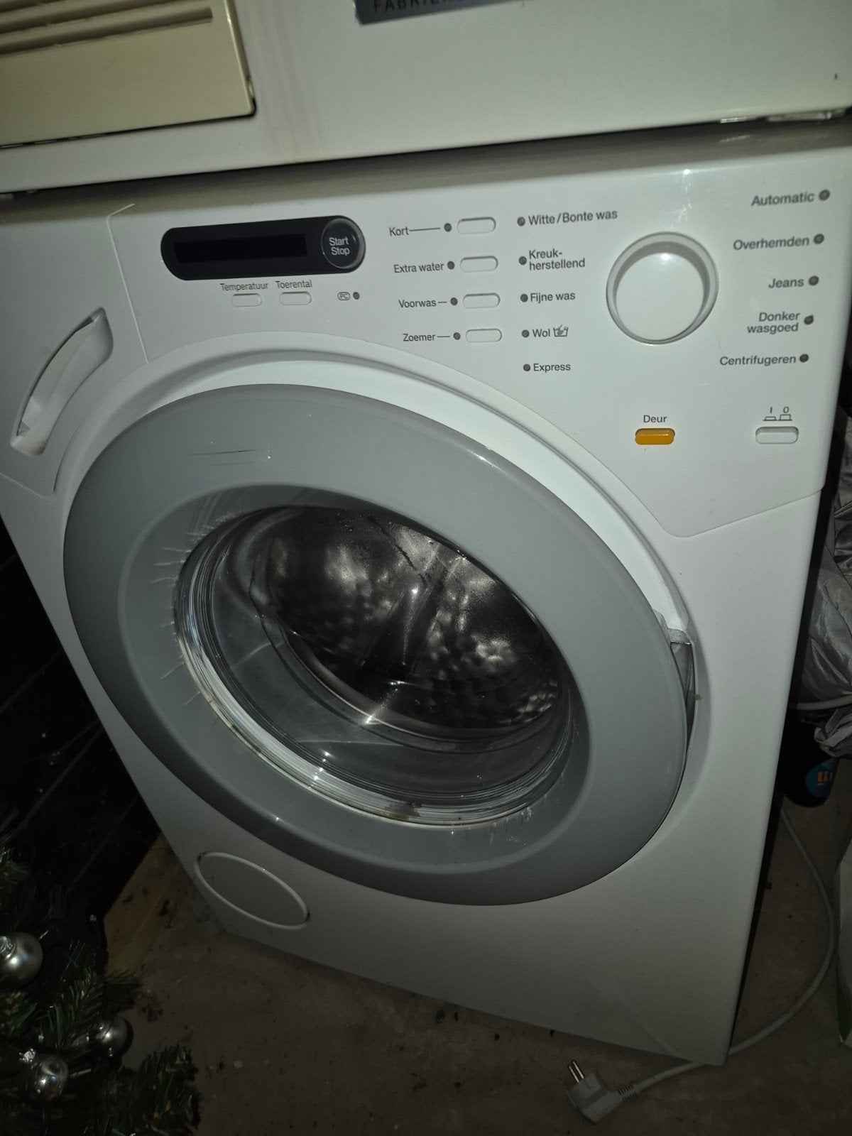 Miele W 1716 SoftCare System Wasmachine, Ophalen
