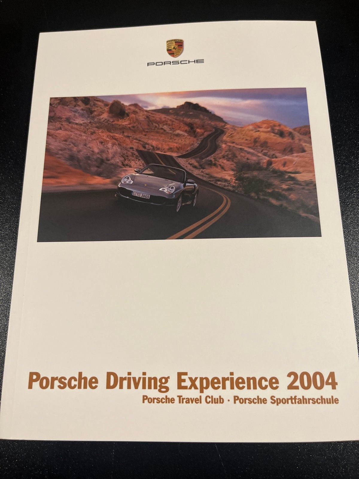 Porsche Driving Experience 2004 Folder, Ophalen of Verzenden, Gelezen, Porsche