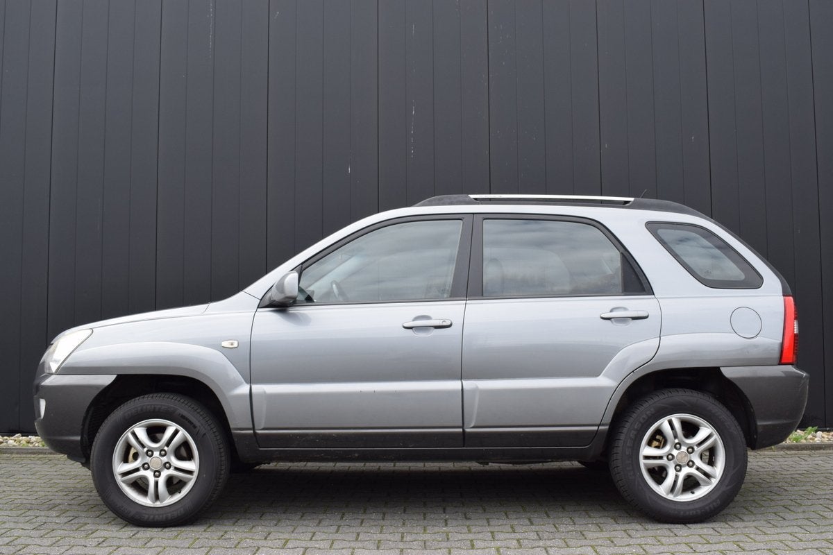 Kia Sportage 2.0 CVVT X-ecutive ECC | Half Leder | Carplay |, 1442 kg, Gebruikt, Zwart, 4 cilinders