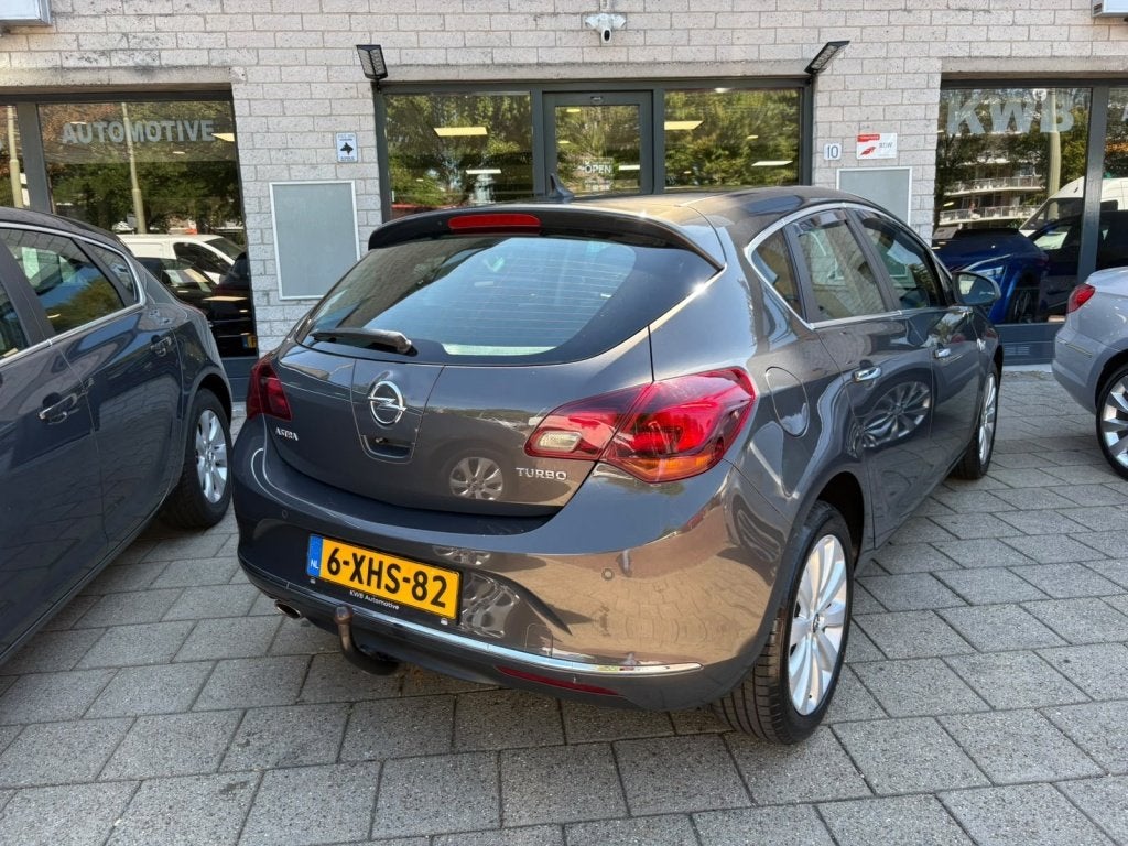Opel Astra 1.4 Turbo Trekhaak Navi Camera Automaat, Auto's, Automaat, Euro 5, 15 km/l, Gebruikt