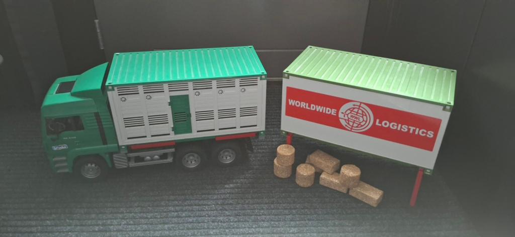 Bruder MAN vrachtwagen met 2 opzetstukken en balen, Ophalen of Verzenden, Zo goed als nieuw