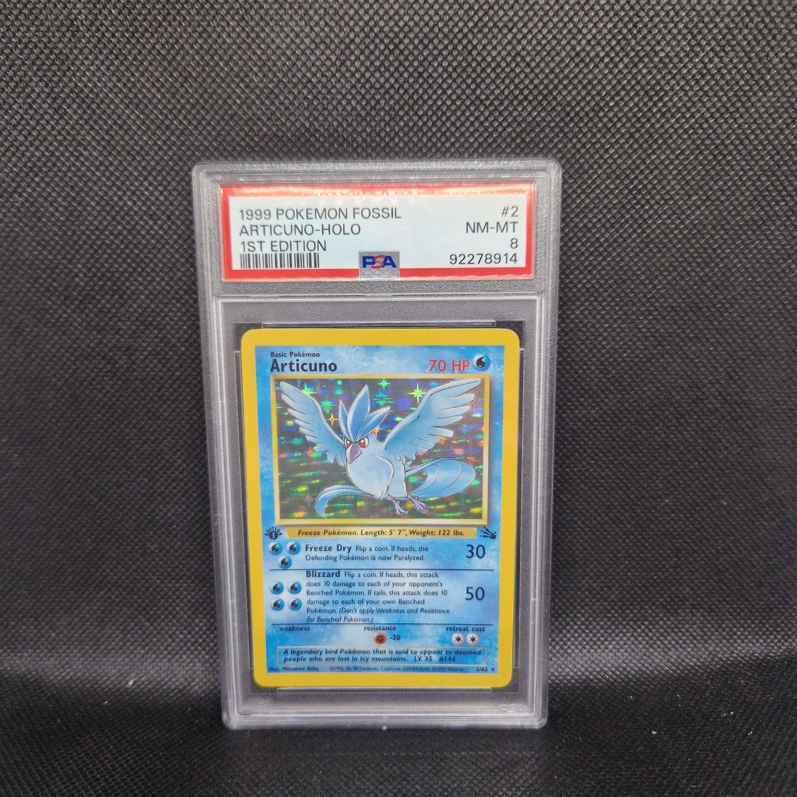 Articuno Holo 1st Edition Fossil PSA 8, Ophalen of Verzenden, Zo goed als nieuw