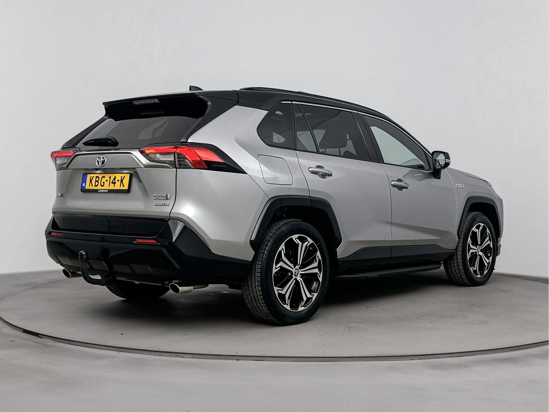 Toyota RAV4 2.5 Plug-in Hybrid AWD Bi-Tone Plus | Panoramada, Auto's, Automaat, 12 maanden, Gebruikt, 4 cilinders