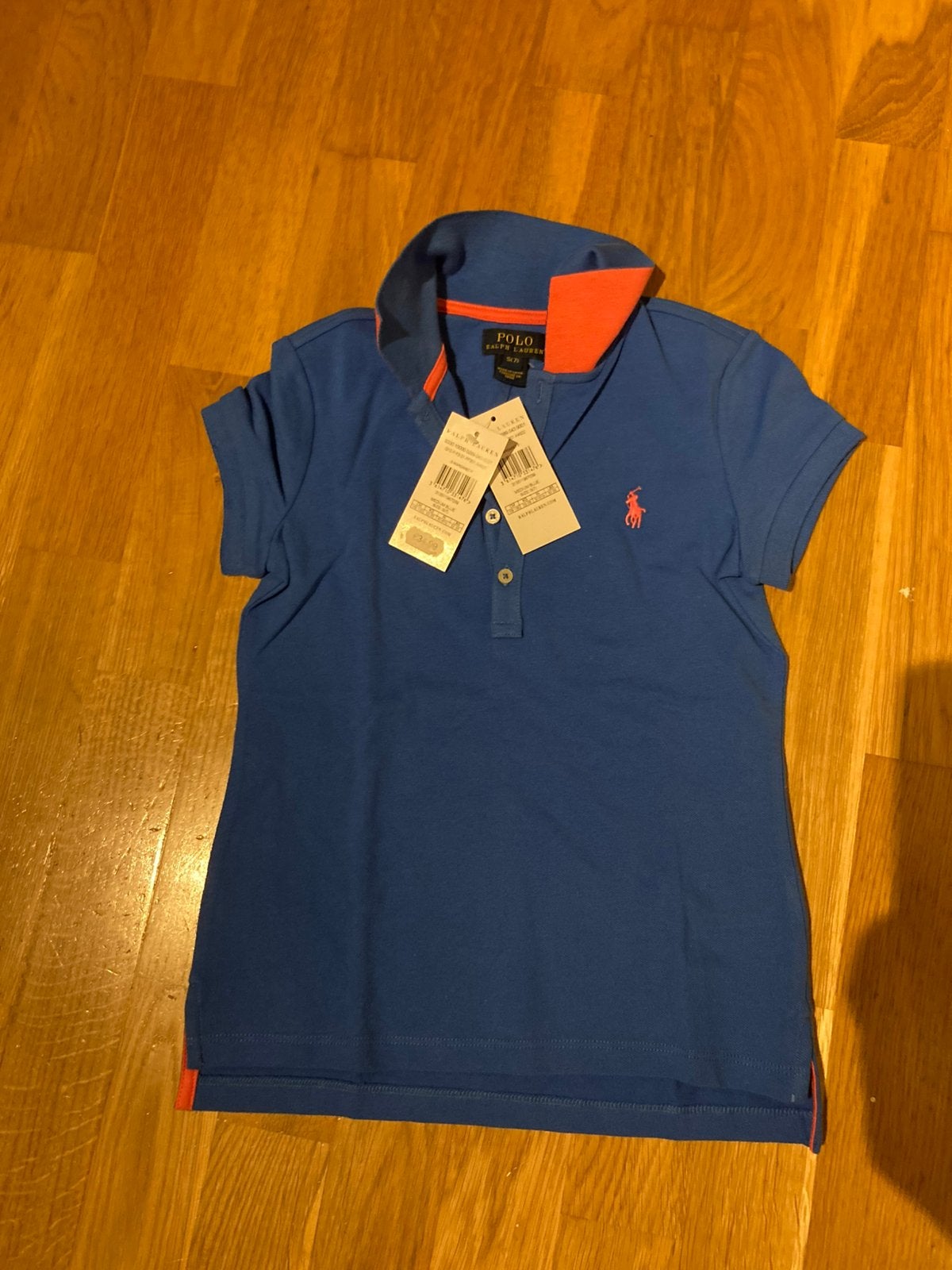 Nieuwe blauwe polo van Ralph Lauren maat 7 jaar, Ophalen of Verzenden, Nieuw, Meisje, Shirt of Longsleeve