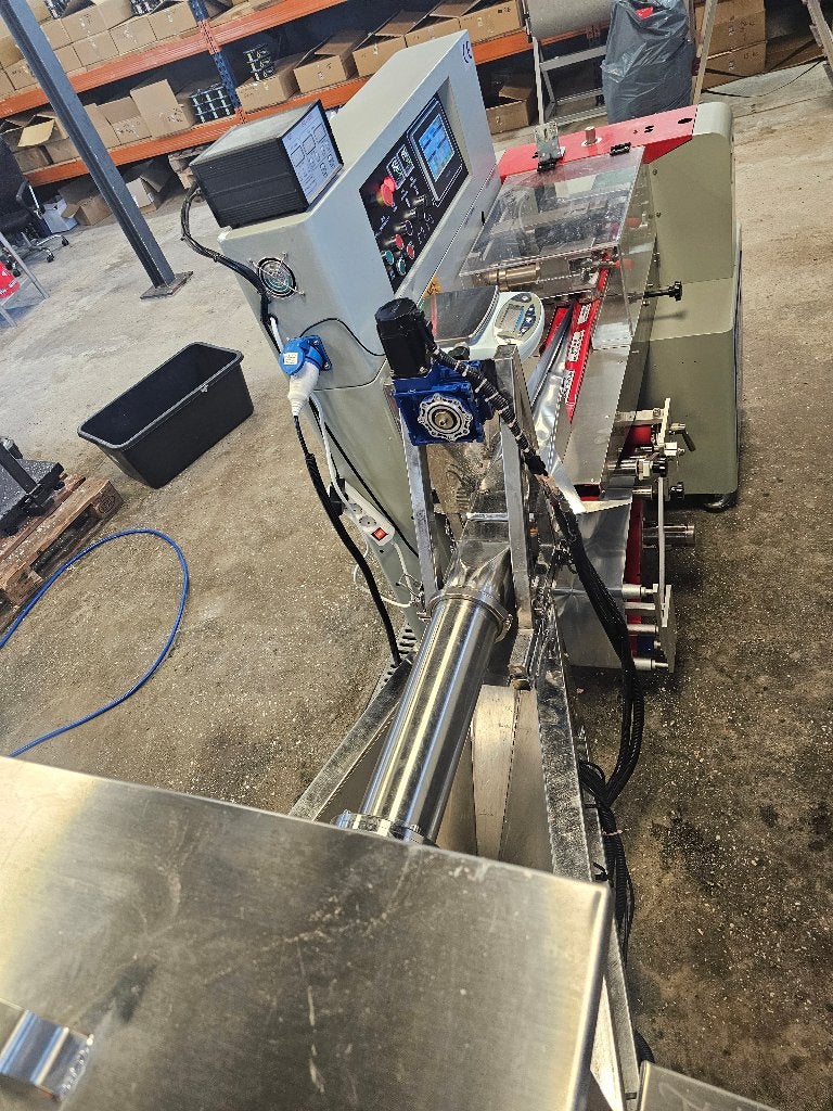 Complete verpakkings-/extruderlijn (extruder + flow‑pack), Ophalen