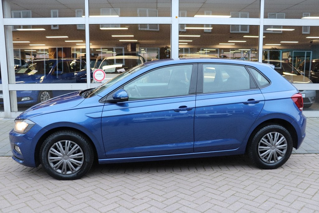 Volkswagen Polo 1.0 TSI Comfortline. Navigatie, Nederlandse, Stof, Gebruikt, Blauw, 49 €/maand