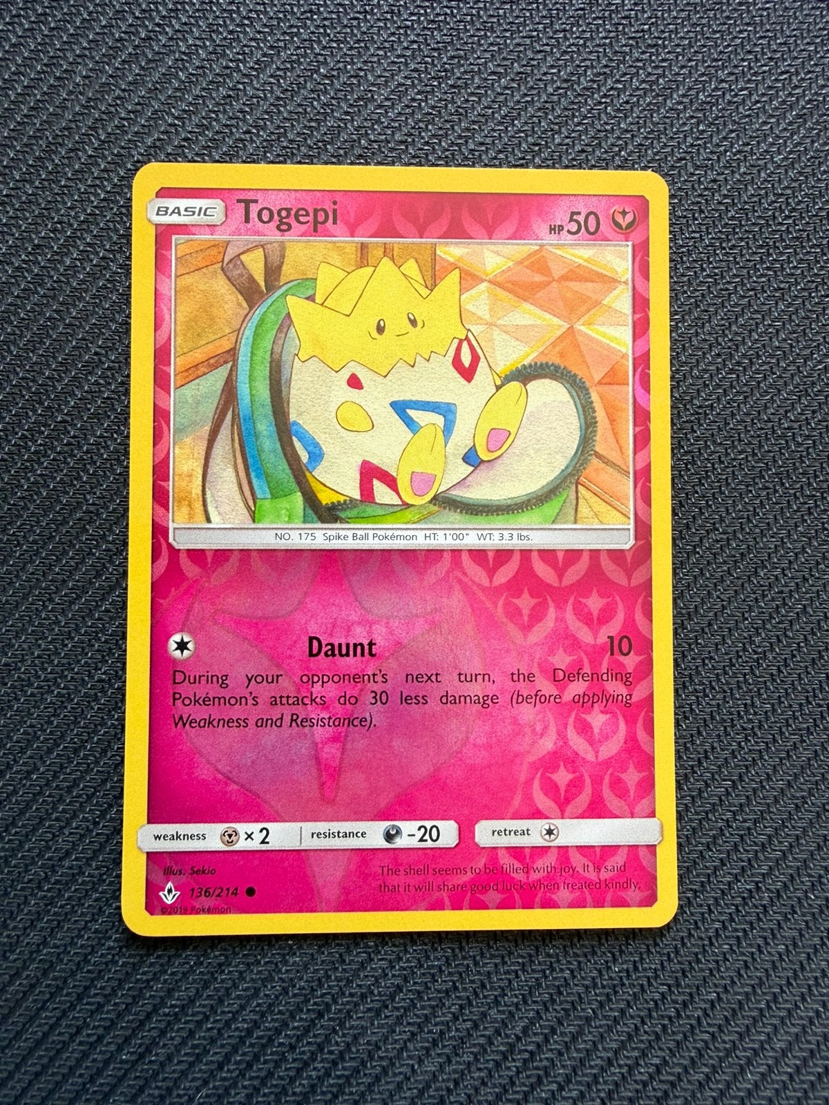 Togepi 136/214 Reverse Holo Unbroken Bonds Pokemon, Ophalen, Nieuw, Losse kaart