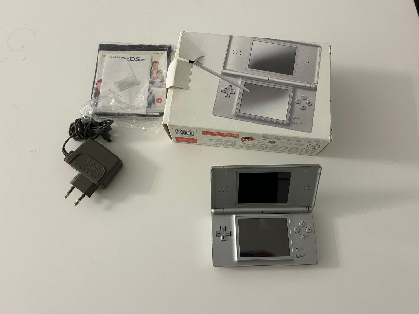Nintendo DS Lite Zilver met doos en oplader, Ophalen of Verzenden, Gebruikt, Zilver, DS Lite