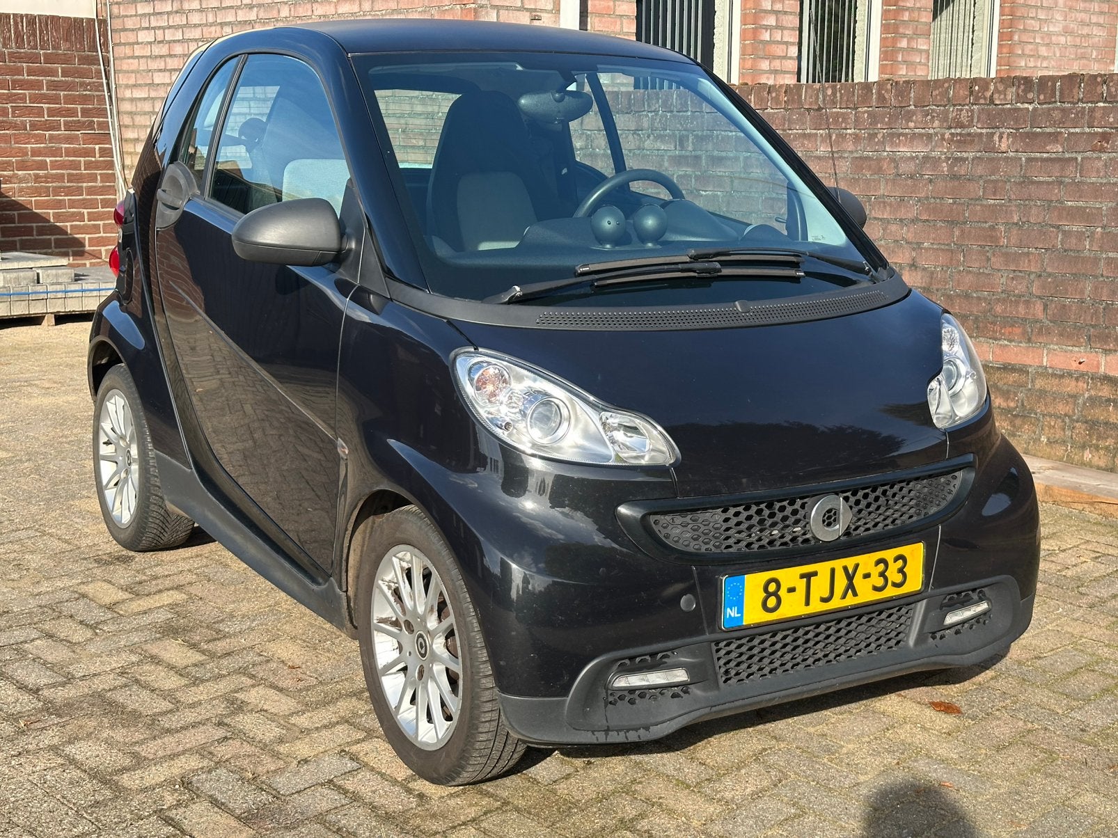 Smart ForTwo 1.0 45KW Coupe MHD AUT 2014 Zwart, Auto's, Automaat, Euro 5, Zwart, 18 €/maand