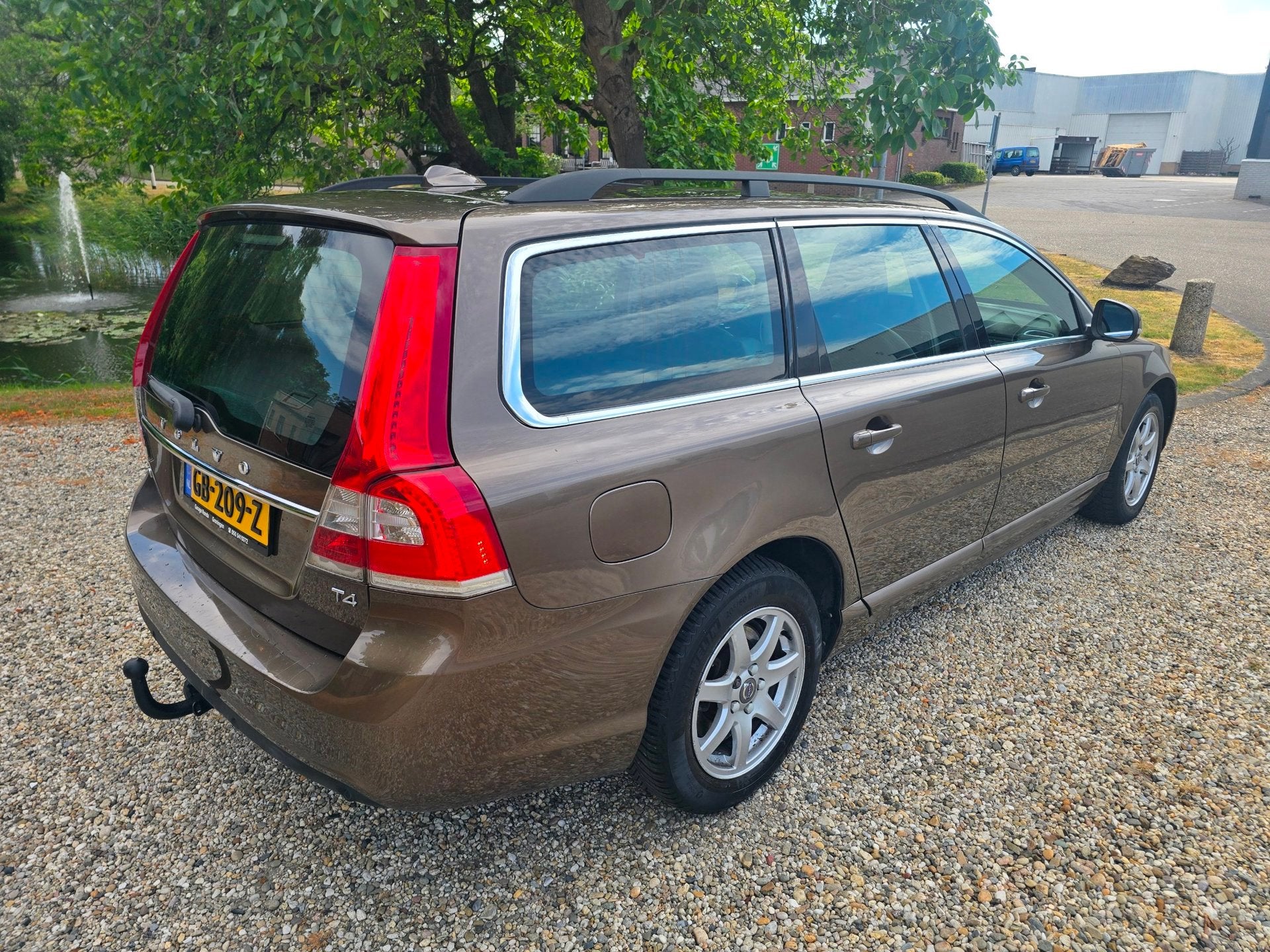 Volvo V70 1.6 T4 Nordic+ XENON/leer/NAVI/cruise, Auto's, Voorwielaandrijving, Gebruikt, Bruin, 1481 kg