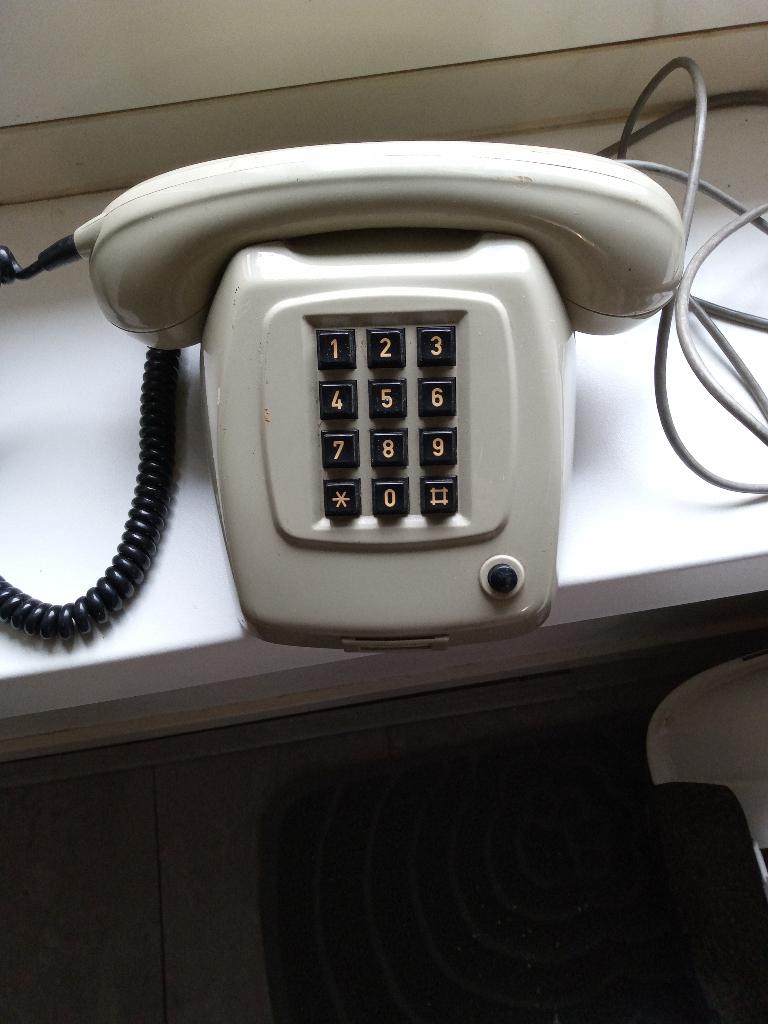 Grijze druktoets telefoon, Ophalen of Verzenden, Gebruikt