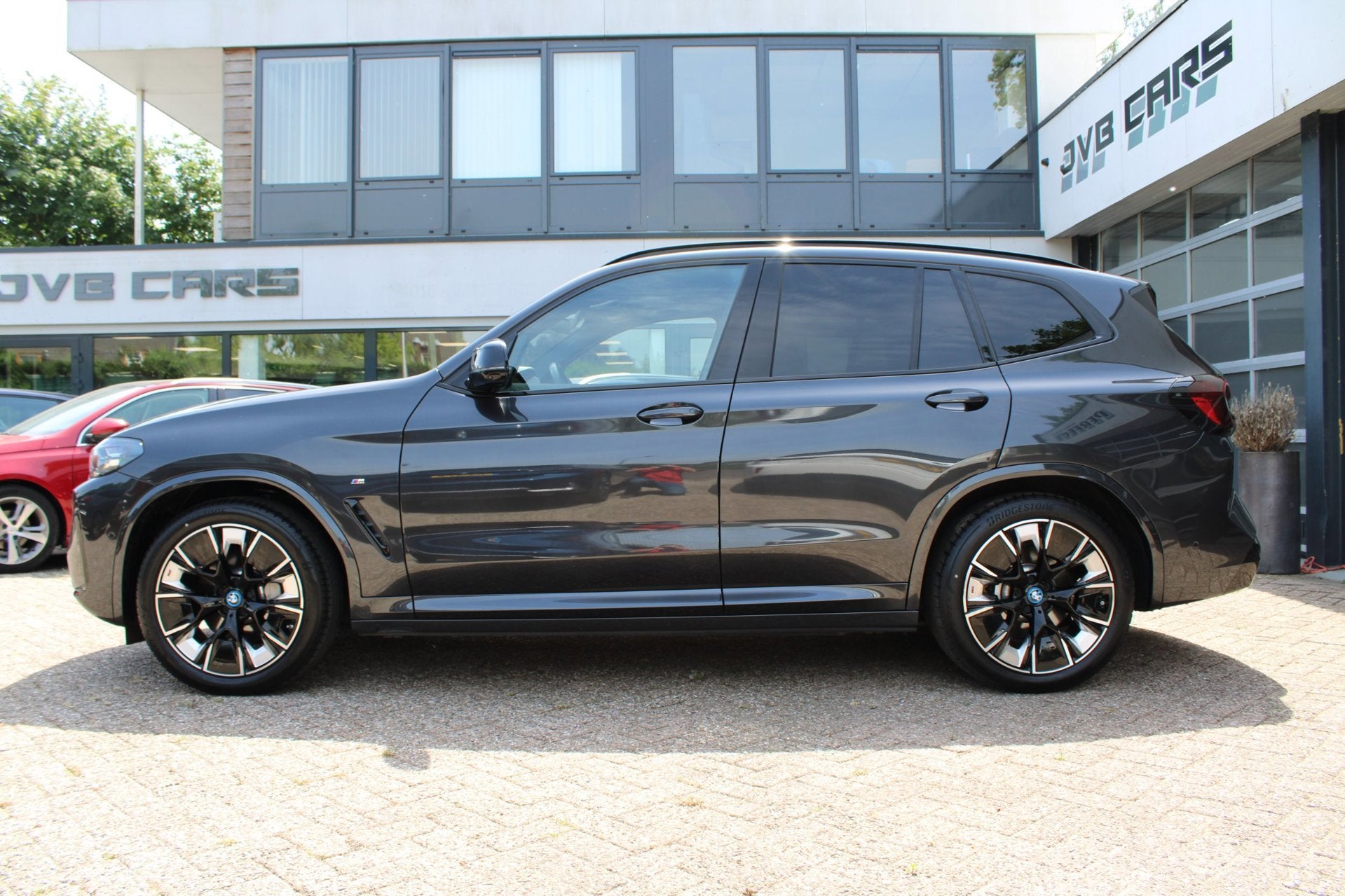 BMW IX3 High Executive 80 kWh/pano/Mpakket, Auto's, Automaat, Gebruikt, Zwart, Leder