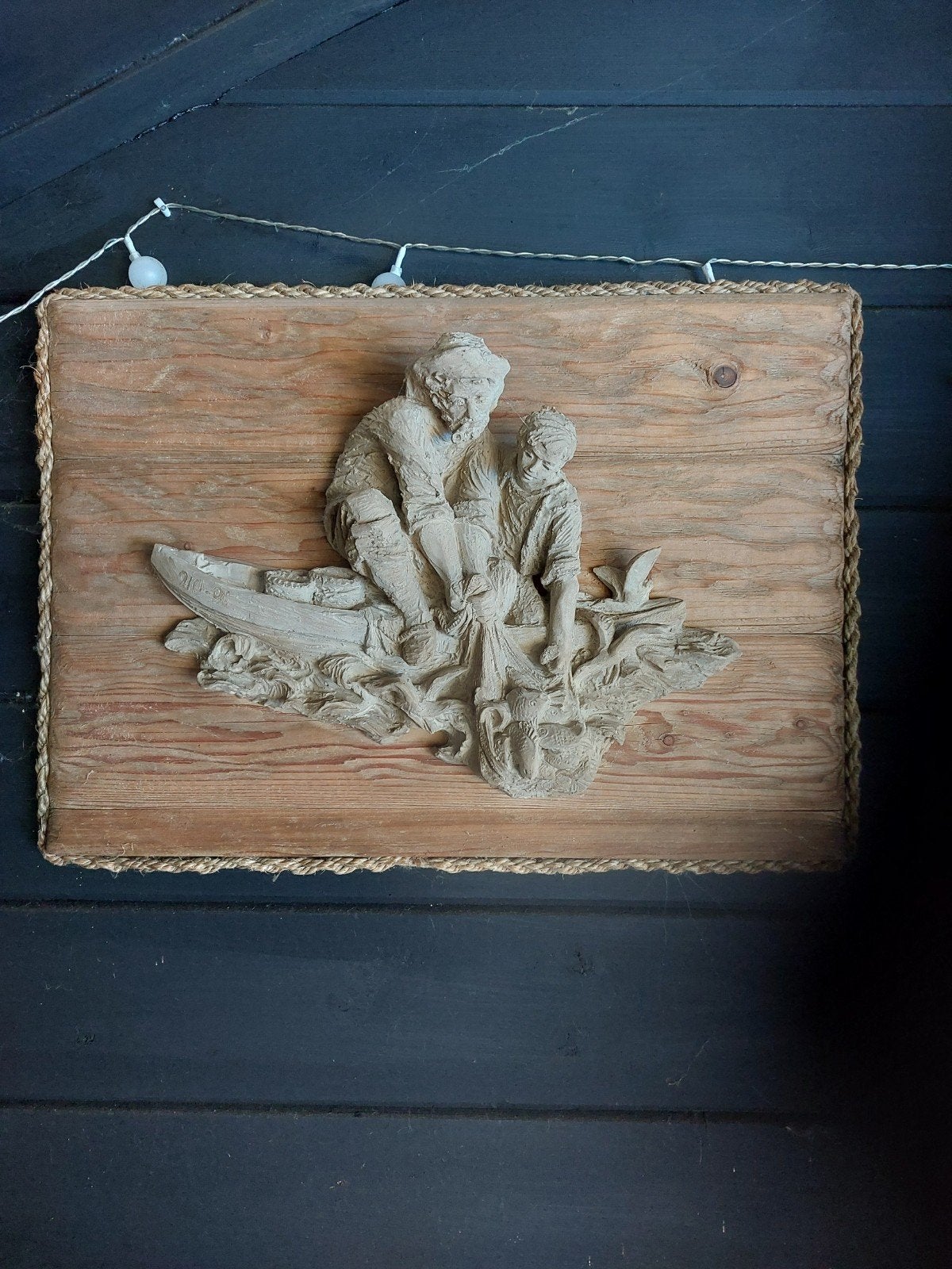 Wanddecoratie: Vissers in boot, Ophalen