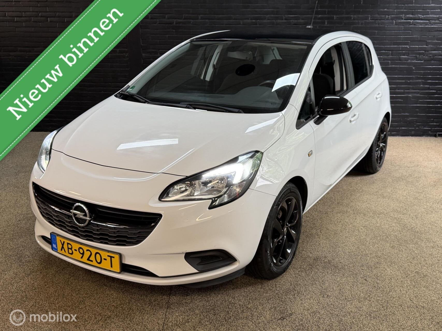 Opel Corsa 1.4 Black Edition NAVIGATIE VELGEN CRUISE PDC NAP, Auto's, Opel, 1063 kg, Gebruikt, 4 cilinders, Origineel Nederlands