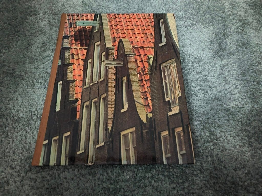 Amsterdam, 20e eeuw of later, Hans Koning, Ophalen of Verzenden, Zo goed als nieuw