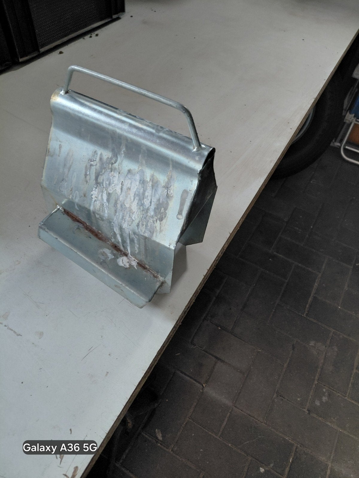 Metalen wielkeg voor aanhanger of caravan, Ophalen