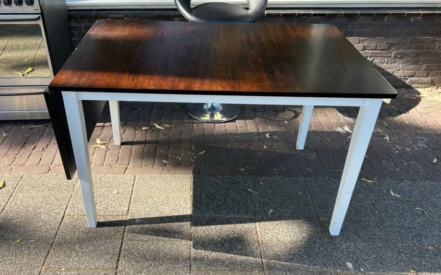 Mooie uitschuifbare eettafel met een donkerbruin blad., Huis en Inrichting, Gebruikt, 200 cm of meer, Rechthoekig, 50 tot 100 cm