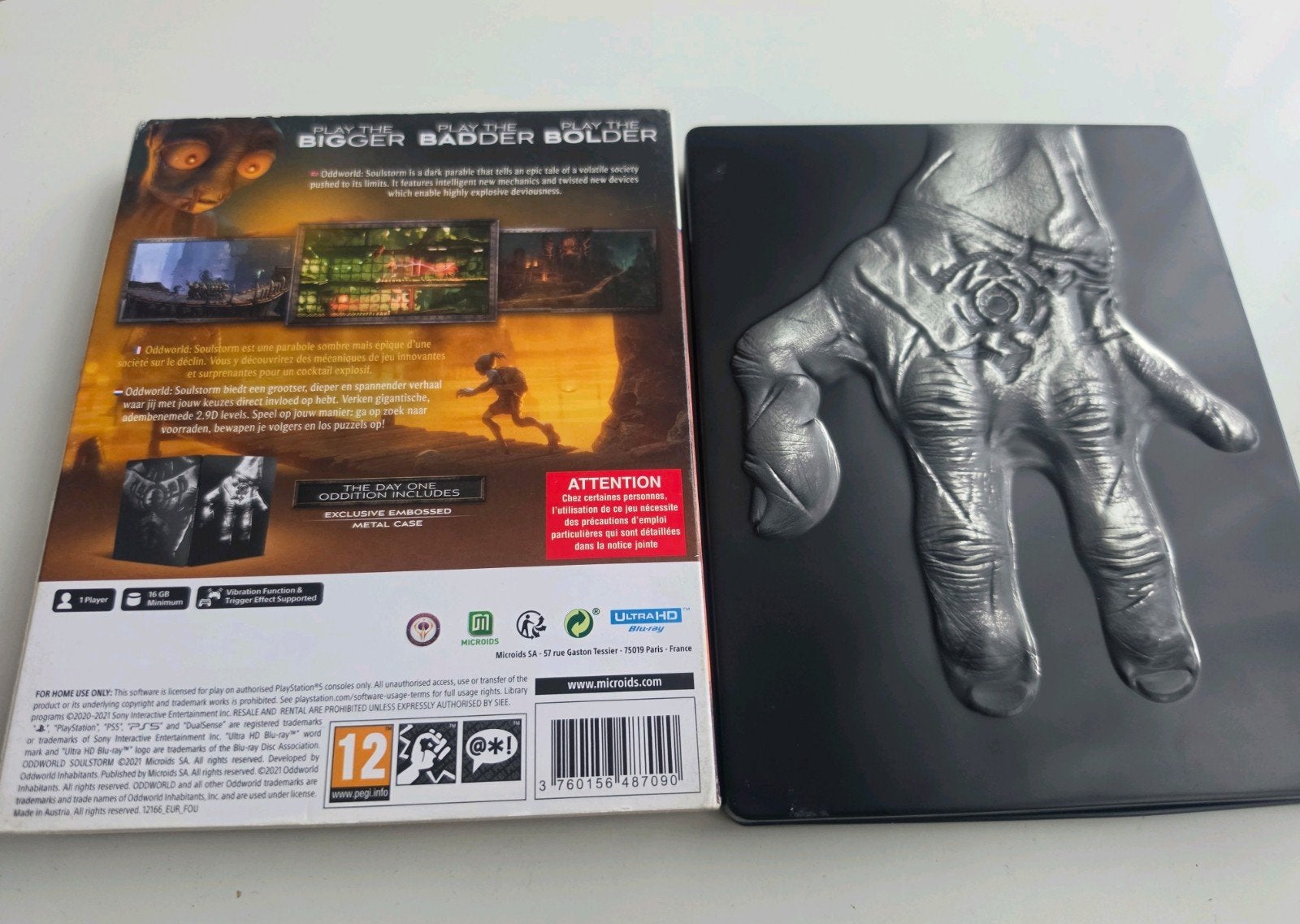 Oddworld: Soulstorm - Day One Oddition (PS5) met Metal Case, Avontuur en Actie, Info@microids.com, 57 rue Gaston Tessier - 75019 Paris - France