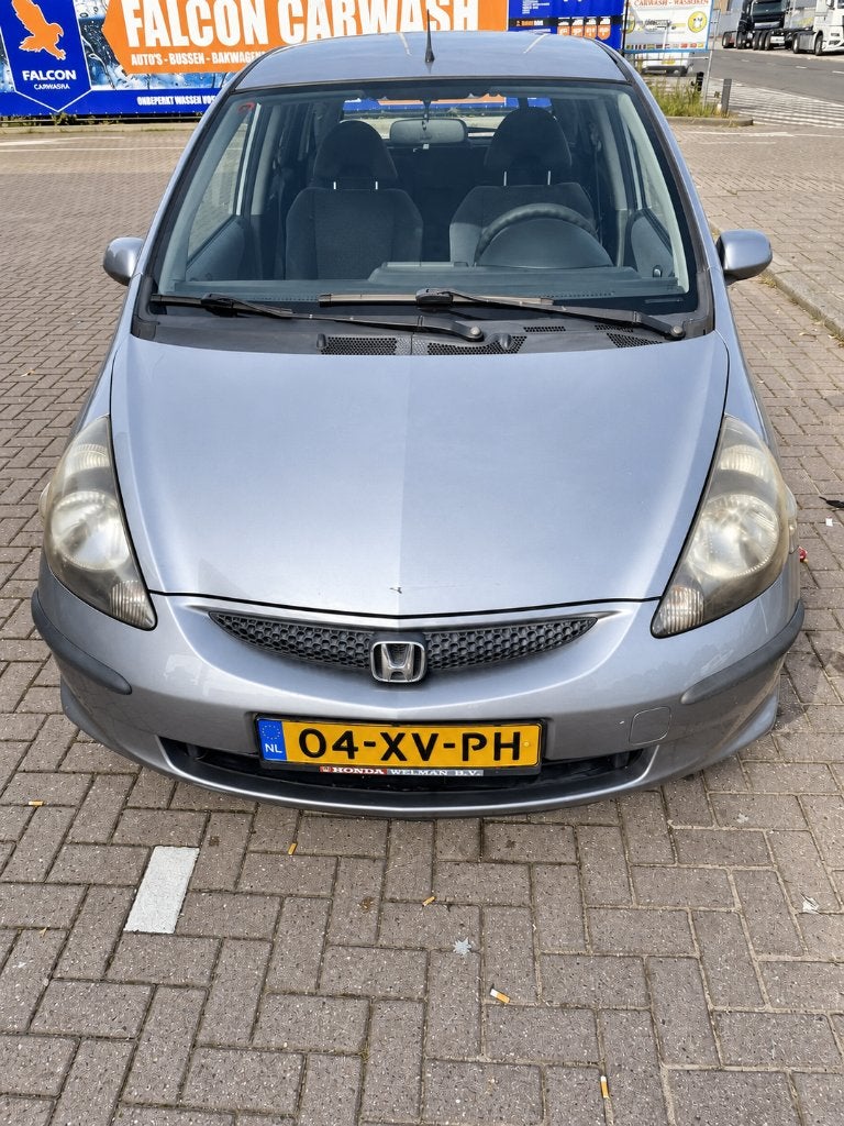 Honda Jazz 1.2 I 2007 Grijs, Auto's, Voorwielaandrijving, 40 €/maand, 4 cilinders, Leder en Stof