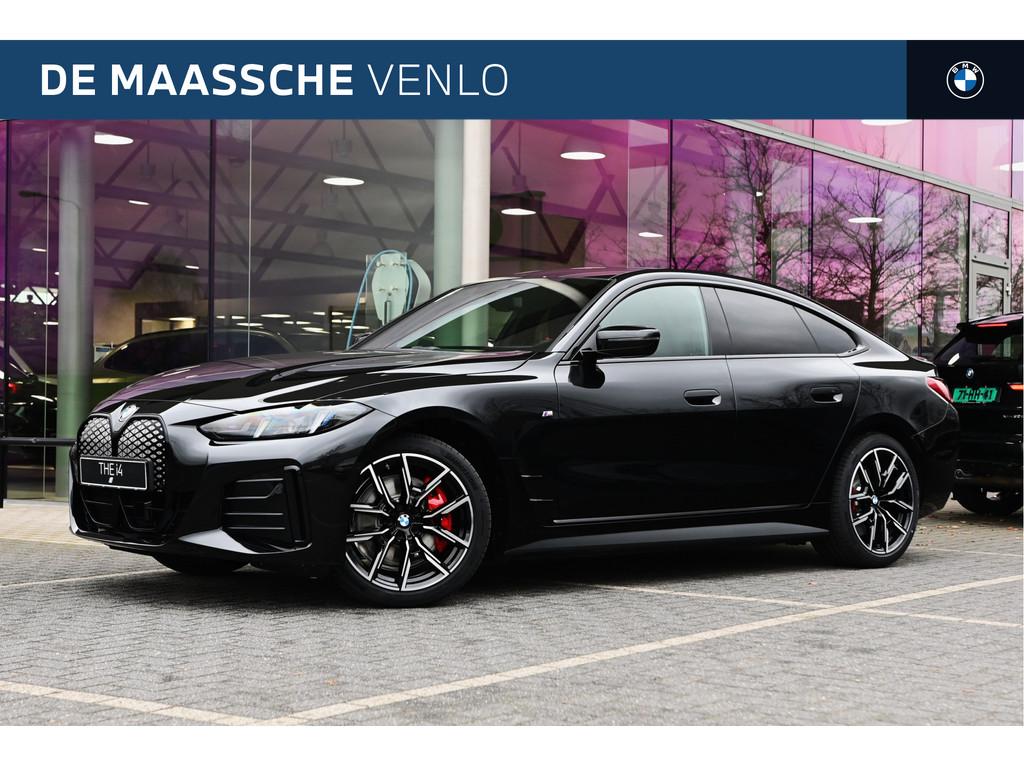 BMW i4 eDrive35 Gran Coupé M Sport / Achteruitrijcamera / A, Auto's, BMW, Achterwielaandrijving, Zwart, Zwart, Leder
