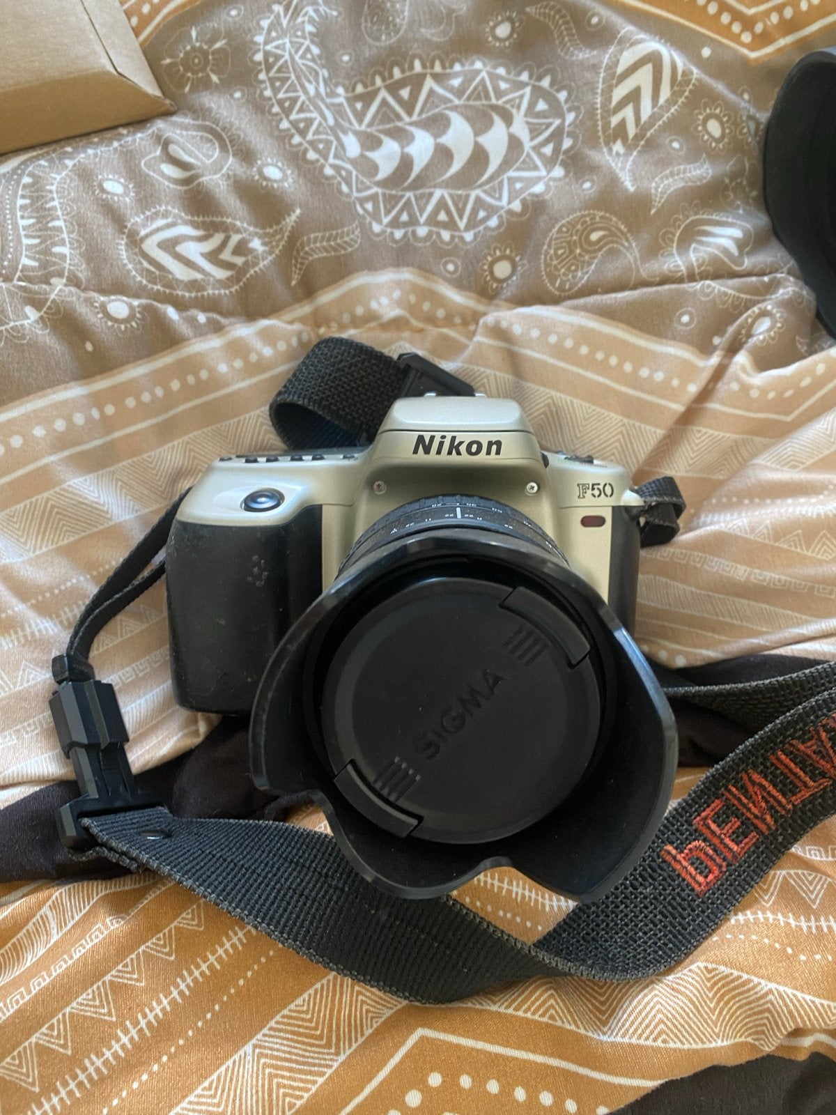 Nikon F50 spiegelreflexcamera met Sigma 28-105mm D lens, Audio, Tv en Foto, Fotocamera's Analoog, Ophalen of Verzenden, Gebruikt