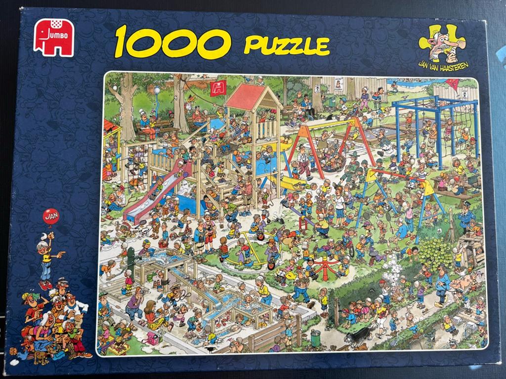 Jan van Haasteren Puzzel Speeltuin 1000 stukjes (doos bescha, Ophalen of Verzenden, 500 t/m 1500 stukjes, Gebruikt, Legpuzzel