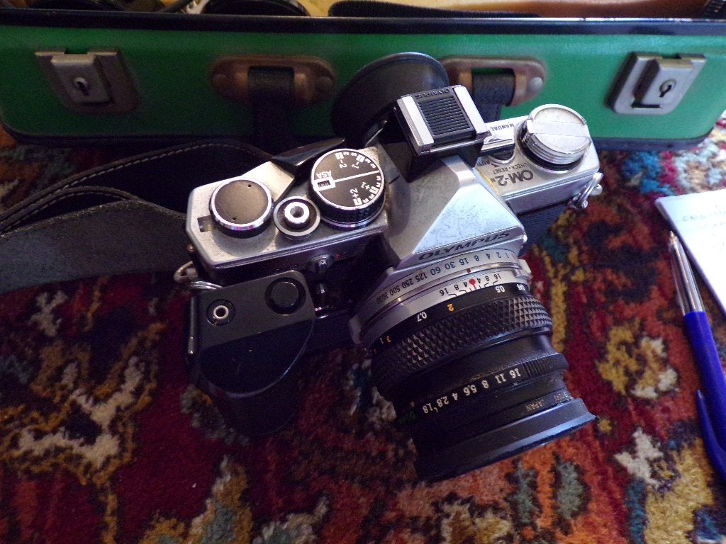 Olympus OM-2 spiegelreflexcamera met veel accessoires, Audio, Tv en Foto, Fotocamera's Analoog, Ophalen of Verzenden, Gebruikt
