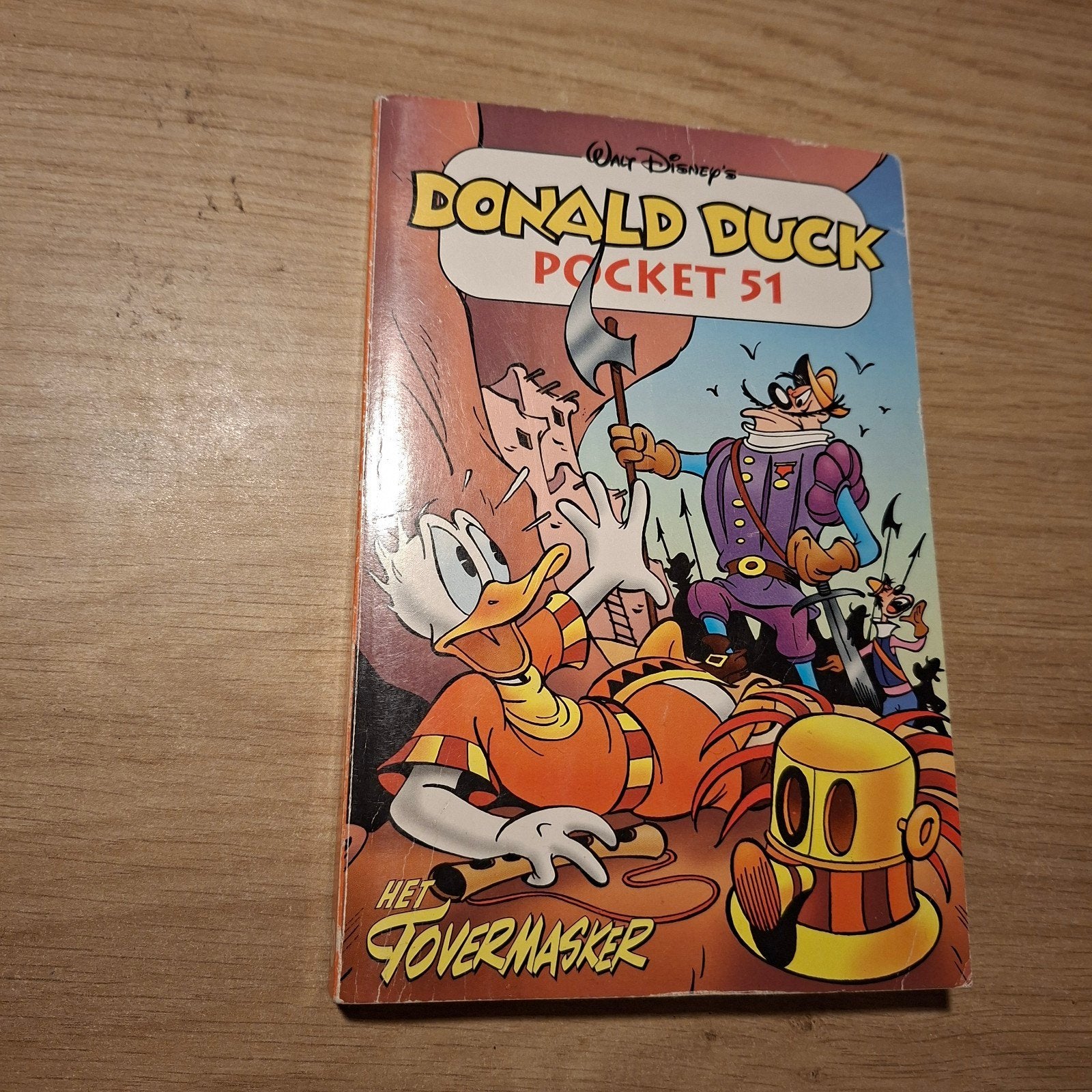 Donald Duck Pocket 51 - Het Tovermasker, Eén stripboek, Ophalen of Verzenden, Gelezen, Walt Disney
