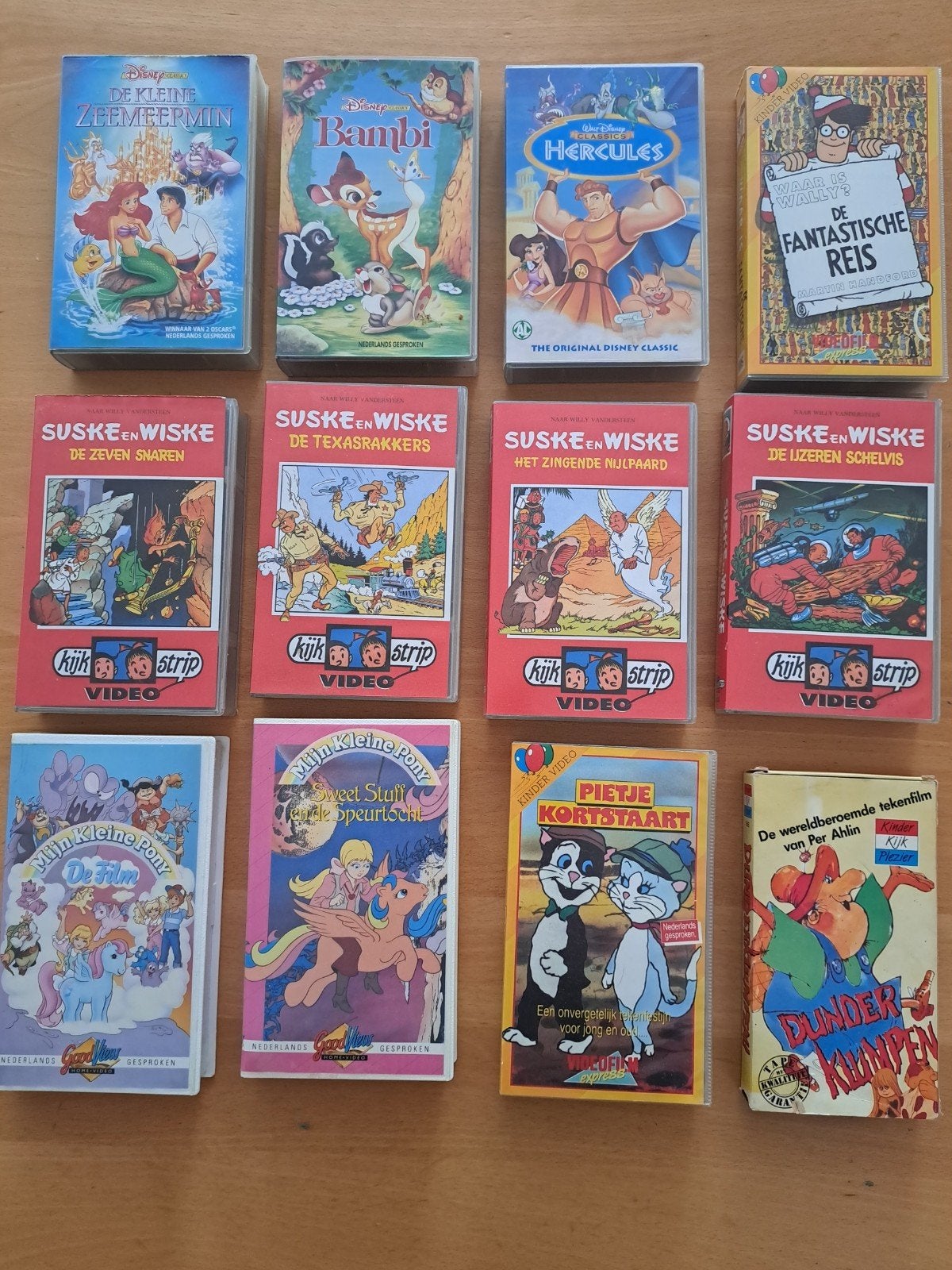 12 VHS videobanden met kinderfilms (Disney, Suske en Wiske), Cd's en Dvd's, Gebruikt, Animatie, Alle leeftijden, VHS