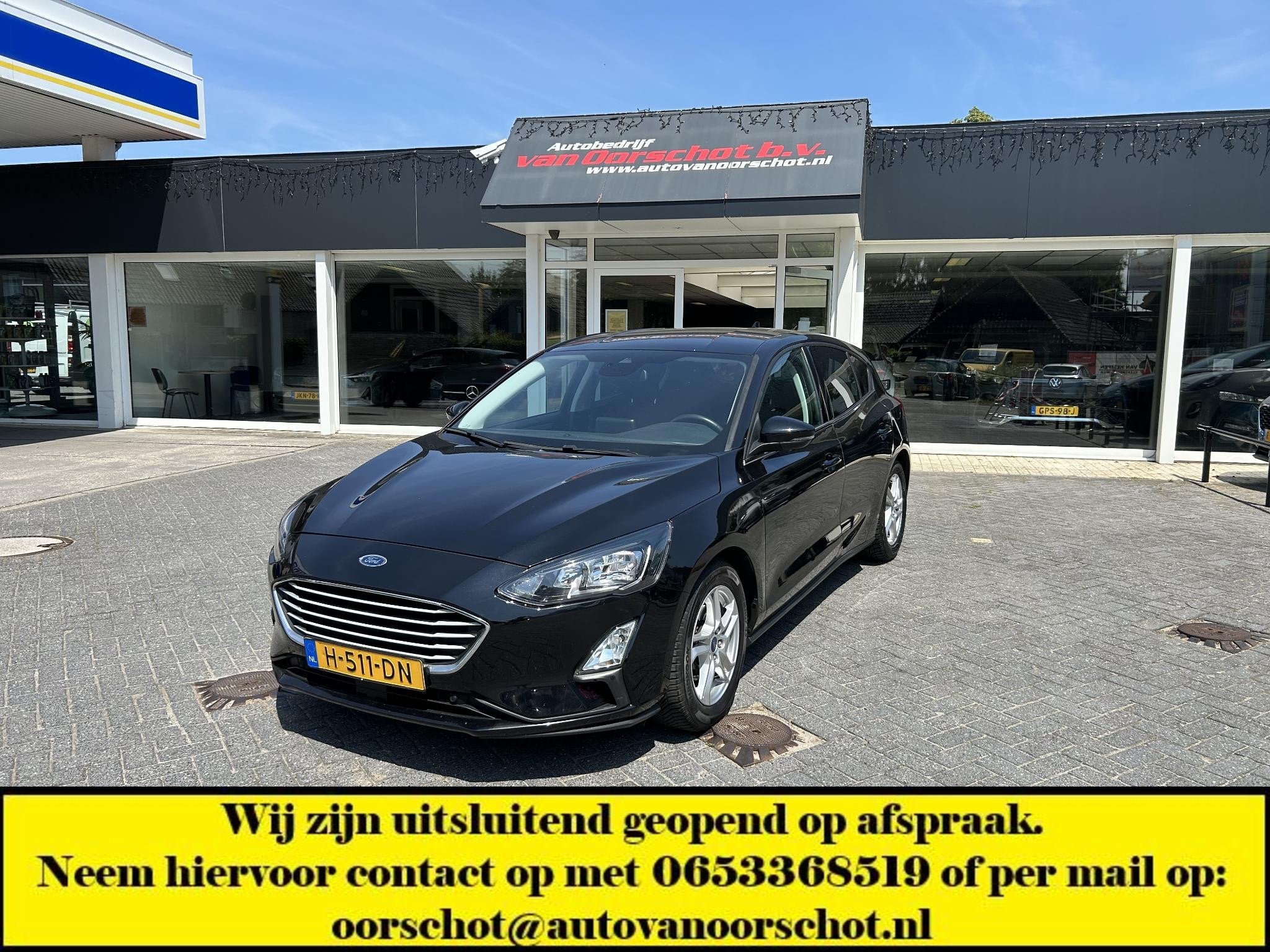 Ford Focus 1.0 EcoBoost Trend Edition Business, Auto's, Gebruikt, Euro 6, Zwart, Origineel Nederlands
