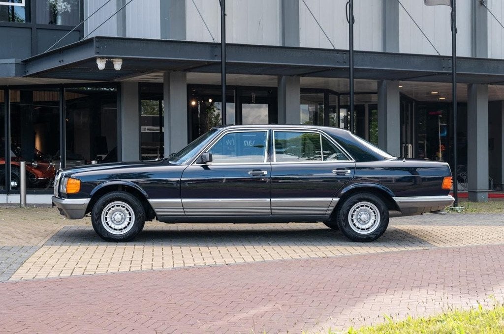 Mercedes-Benz S-Klasse 280 SE (bj 1985, automaat), Auto's, Oldtimers, Automaat, Stof, Blauw, Bedrijf