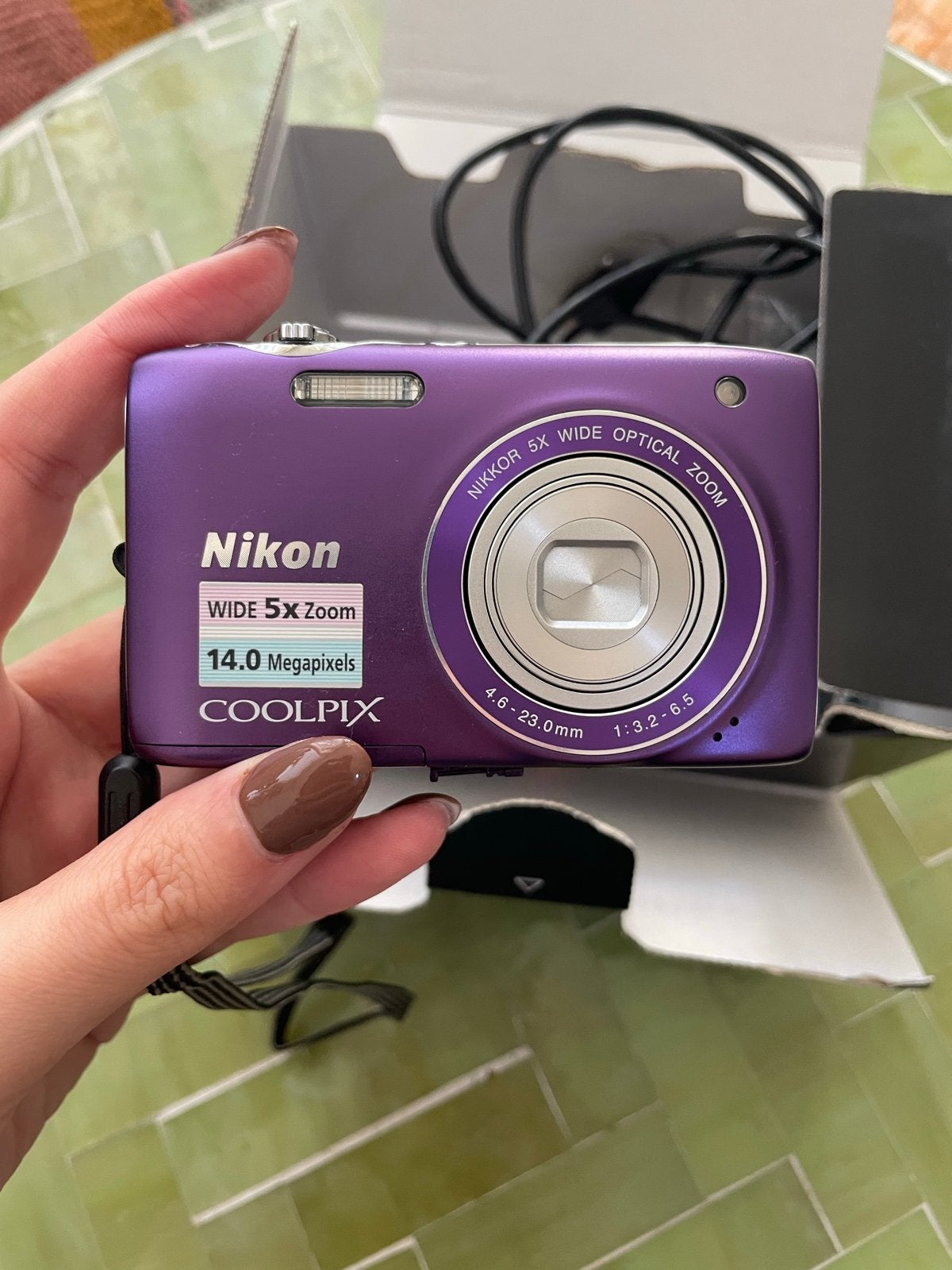 Nikon Coolpix S3100 paars - vrijwel nieuw, compleet, Ophalen of Verzenden, Zo goed als nieuw, Compactcamera, 4 t/m 7 keer