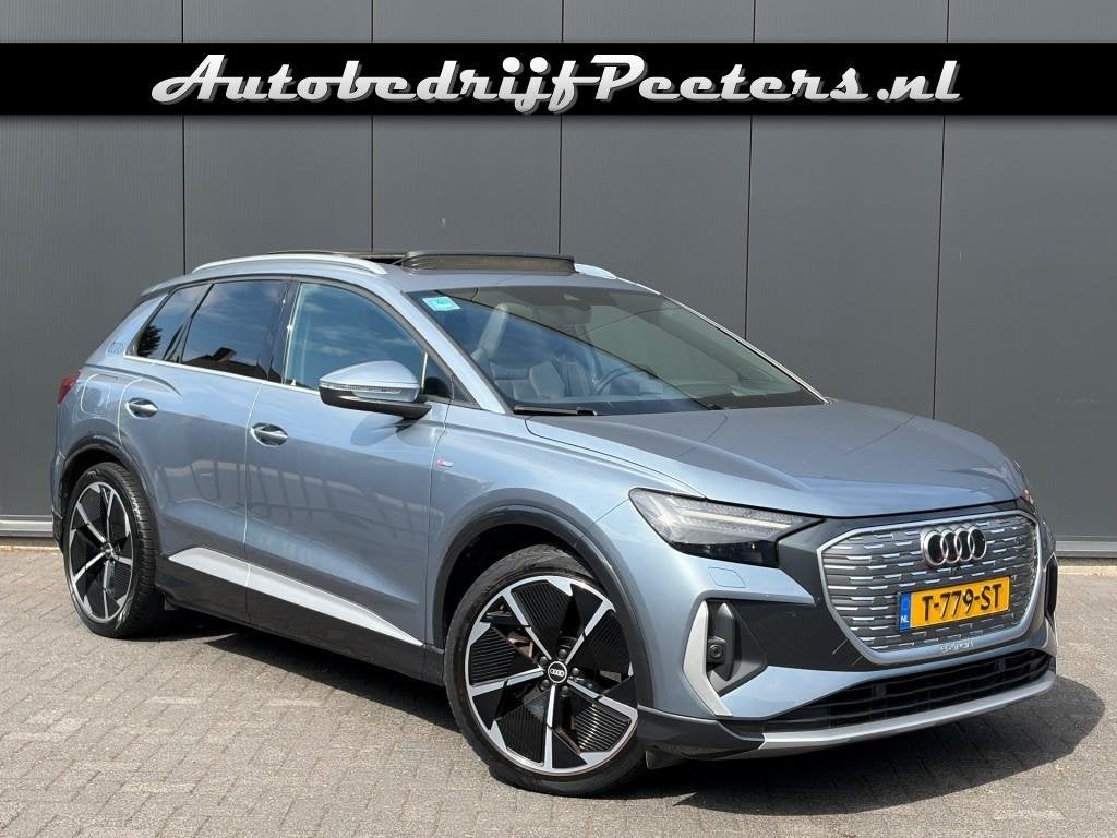 Audi Q4 E-TRON 40 S-line 77kWh Pano Matrix Leder HUD ACC Son, Auto's, Audi, Automaat, Achterwielaandrijving, Gebruikt, Blauw