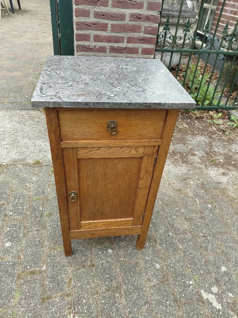 Art Deco eiken nachtkastje met antraciet marmeren blad., Antiek en Kunst, Ophalen