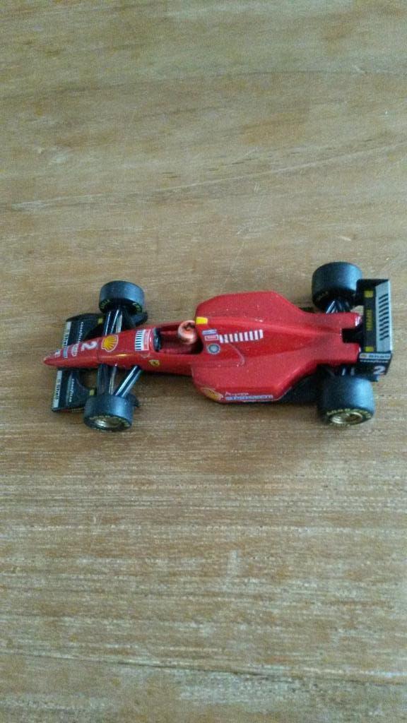 Ferrari F310 1996 Minichamps schaal 1:64 Eddie Irvine, Verzenden, Zo goed als nieuw, Auto, MiniChamps