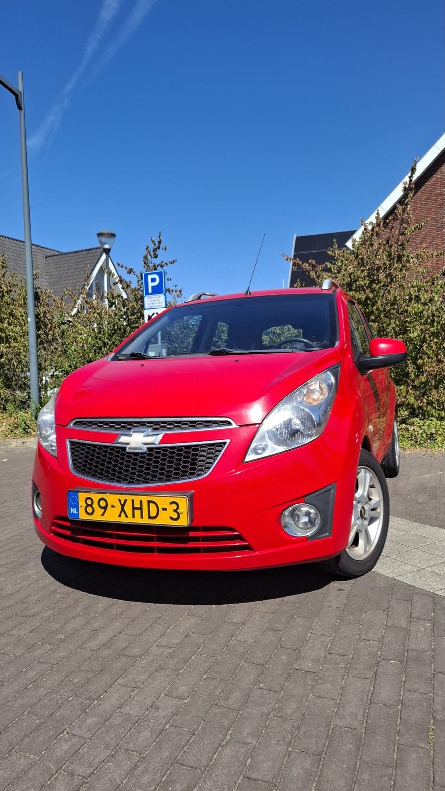 Chevrolet Spark 1.0 Bifuel 2012 Rood, Auto's, 15 km/l, 37 €/maand, 4 cilinders, Origineel Nederlands