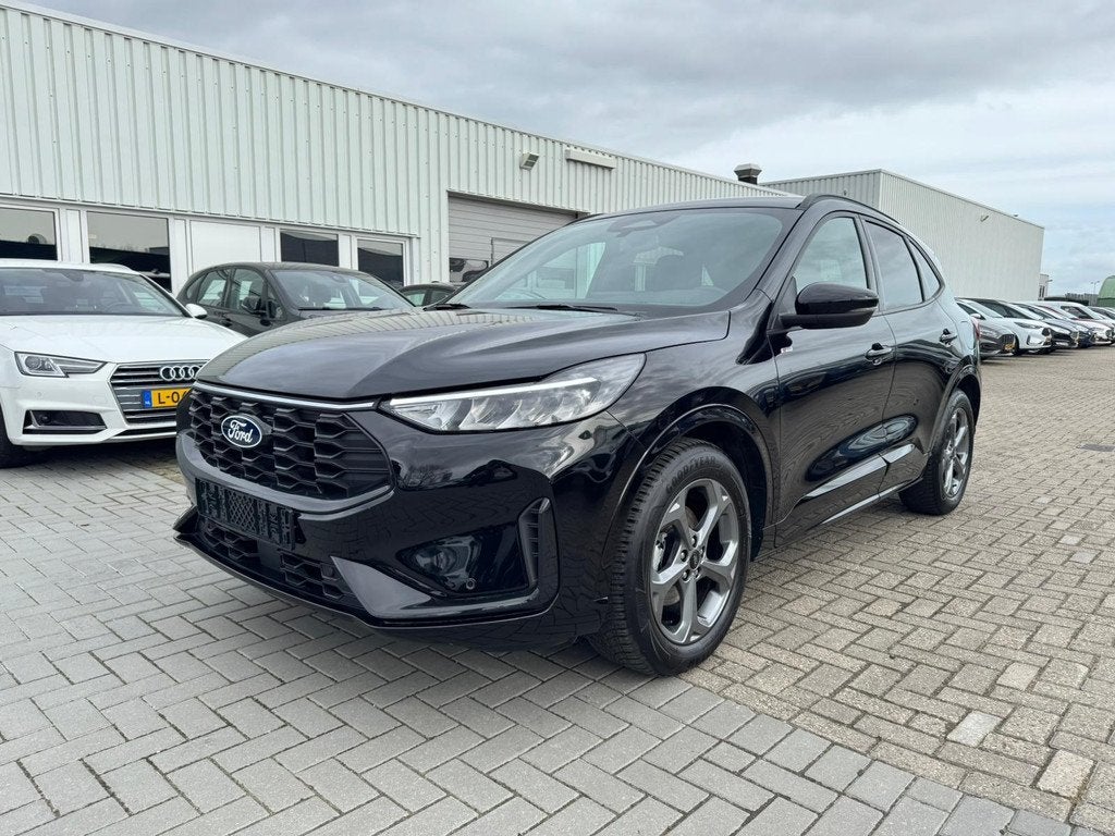 Ford Kuga 2.5 FHEV ST-Line 190pk | Winterpack | Achteruitrij, Stof, Gebruikt, 1589 kg, Zwart