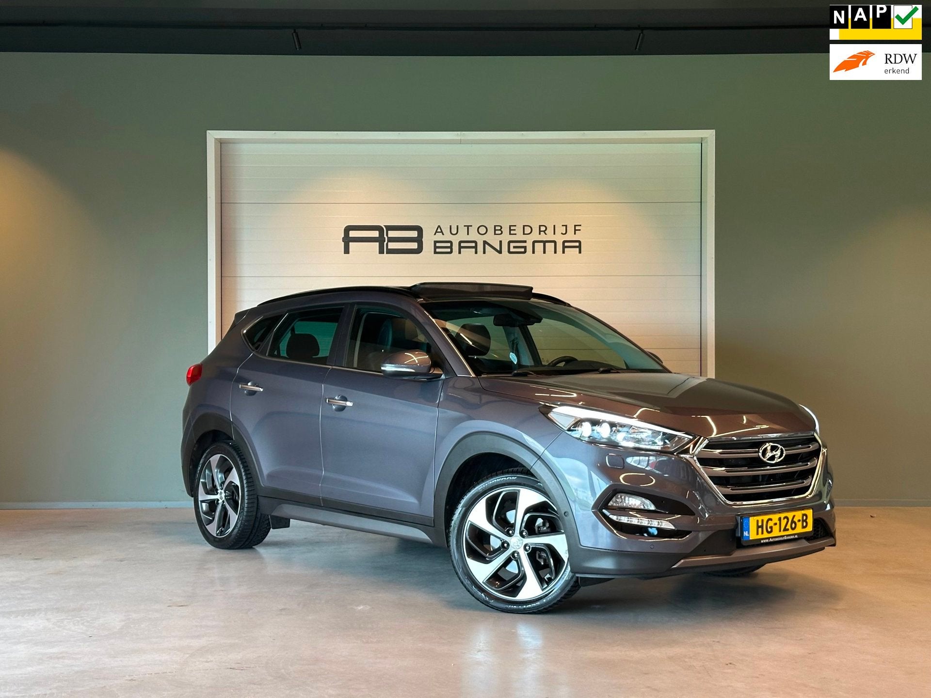 Hyundai Tucson 1.6 T-GDi 4WD AUTOMAAT PREMIUM|CLIMA AIRCO|PA, Auto's, Dealer onderhouden, Gebruikt, 4 cilinders, Met garantie (alle)