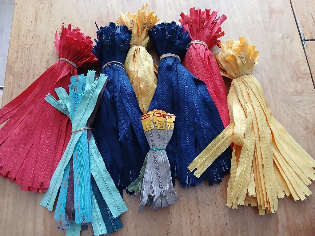 Optilon ritsen, Ophalen, Nieuw, Rits of Sluiting