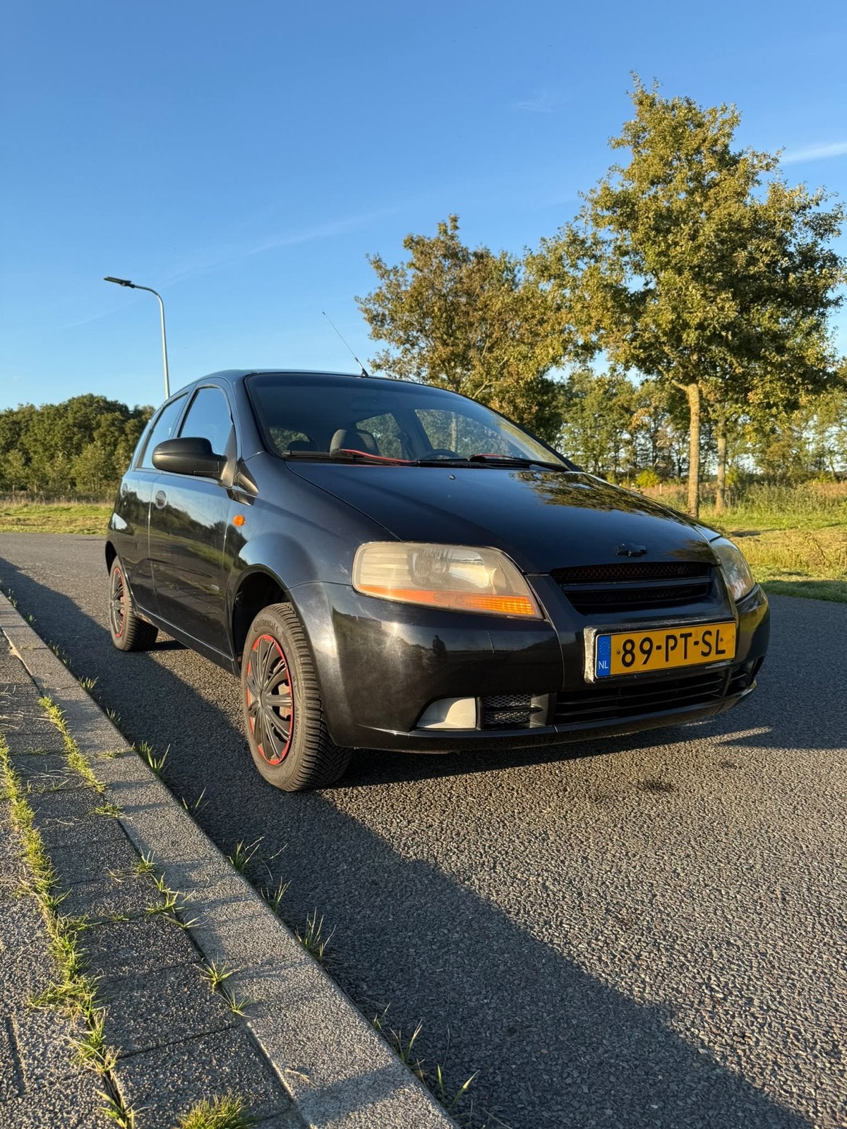 Daewoo/Chevrolet Kalos 1.2 2004 Zwart, Auto's, Voorwielaandrijving, 1150 cc, 31 €/maand, 4 cilinders